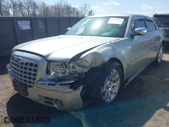 2006 Chrysler 300 C with VIN 2C3LA63H06H105774, listed as a IAAI auction lot 41918634 with 319,232 mi miles. Bid and sale history available at carsss.com. Image 6.
