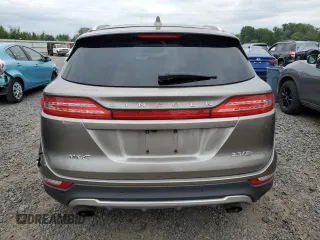 2016 Lincoln MKC Reserve with VIN 5LMTJ3DH3GUJ11911, listed as a Copart auction lot 58439465 with 107,441 mi miles and Salvage title. Bid and sale history available at DreamBid. Image 6.