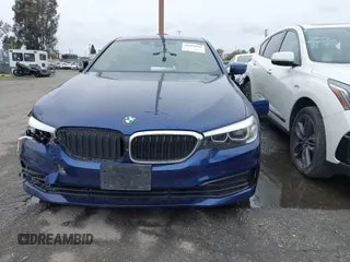 2019 BMW 5 Series 530e iPerformance with VIN WBAJA9C59KB389898, listed as a IAAI auction lot 41479595 with 90,965 mi miles. Bid and sale history available at carsss.com. Image 12.