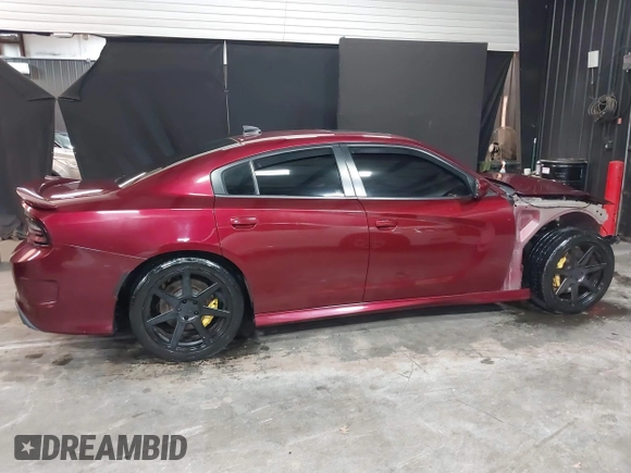 2019 Dodge Charger SRT Hellcat with VIN 2C3CDXL92KH693077, listed as a IAAI auction lot 39361432 with 57,522 mi miles and . Bid and sale history available at DreamBid. Image 14.