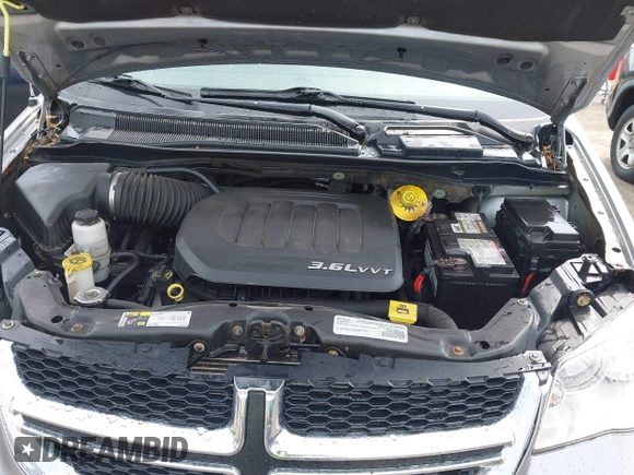 2016 Dodge Grand Caravan SE with VIN 2C4RDGBG5GR251689, listed as a IAAI auction lot 42149865 with 137,410 mi miles and . Bid and sale history available at DreamBid. Image 10.
