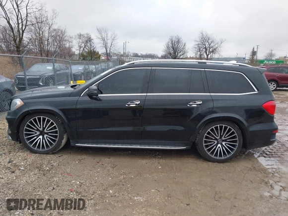 2014 Mercedes-Benz GL-Class GL 550 with VIN 4JGDF7DE1EA274612, listed as a IAAI auction lot 41710174 with 105,094 mi miles. Bid and sale history available at carsss.com. Image 14.