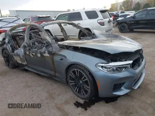 2019 BMW M5 Competition with VIN WBSJF0C57KB284754, listed as a IAAI auction lot 40964230 with 1 mi miles. Bid and sale history available at carsss.com. Image 1.