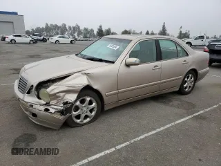 2002 Mercedes-Benz E-Class with VIN WDBJF65J92B404315, listed as a Copart auction lot 75481094 with 87,383 mi miles and Salvage Title. Bid and sale history available at carsss.com. Image 1.