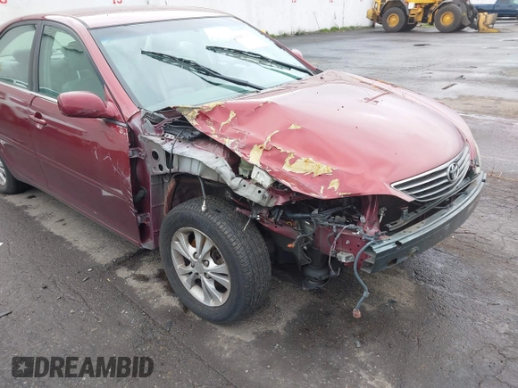 2005 Toyota Camry LE with VIN 4T1BF32K95U092132, listed as a IAAI auction lot 41831969 with 103,466 mi miles and . Bid and sale history available at DreamBid. Image 6.