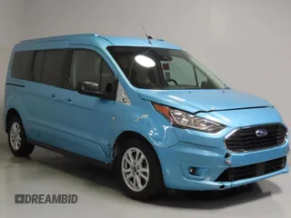 2020 Ford Transit Connect XLT with VIN NM0GE9F2XL1476037, listed as a Copart auction lot 58669295 with 23,542 mi miles and Salvage title. Bid and sale history available at DreamBid. Image 1.