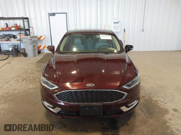 2017 Ford Fusion Titanium with VIN 3FA6P0K91HR171231, listed as a IAAI auction lot 41131312 with 115,265 mi miles. Bid and sale history available at carsss.com. Image 12.