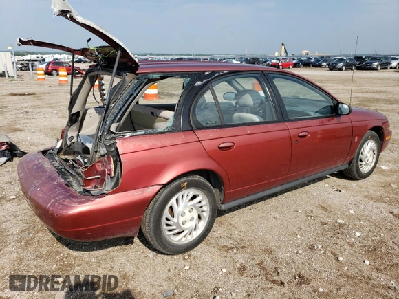 1999 Saturn SW z VIN 1G8ZK827XXZ348270, wystawiony jako Copart lot #67872244 z przebiegiem 110 936 mil mil oraz Szkody całkowita. Historia ofert i sprzedaży dostępna na DreamBid. Obrazek 3.