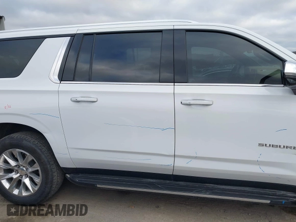 2023 Chevrolet Suburban Premier with VIN 1GNSKFKT1PR529998, listed as a IAAI auction lot 41157457 with 21,551 mi miles and . Bid and sale history available at DreamBid. Image 13.