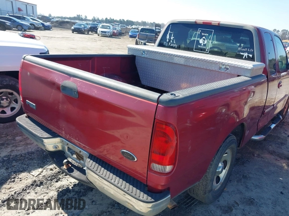 2000 Ford F-150 XL with VIN 1FTZX1725YNA94343, listed as a IAAI auction lot 41659358 with 295,337 mi miles. Bid and sale history available at carsss.com. Image 4.