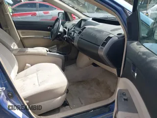 2005 Toyota Prius with VIN JTDKB20U957040822, listed as a IAAI auction lot 42129542 with 214,455 mi miles. Bid and sale history available at carsss.com. Image 5.