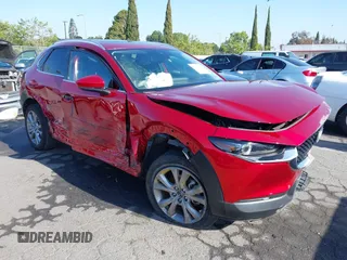 2022 Mazda CX-30 S Premium с VIN 3MVDMBDL0NM454855, выставлен на аукционе IAAI как лот 42276095 с пробегом 21 192 миль миль и . История ставок и продаж доступна на DreamBid. Изображение 1.