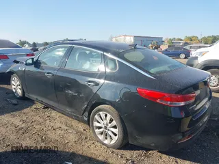 2016 Kia Optima EX with VIN 5XXGU4L39GG054891, listed as a IAAI auction lot 40325310 with 112,457 mi miles and . Bid and sale history available at DreamBid. Image 3.