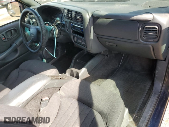 2003 GMC Jimmy z VIN 1GKCT18X43K110056, wystawiony jako Copart lot #48671585 z przebiegiem 272 867 mil mil oraz Czysty tytuł • Clean title. Historia ofert i sprzedaży dostępna na DreamBid. Obrazek 8.