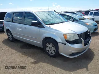2012 Dodge Grand Caravan SE with VIN 2C4RDGBGXCR360045, listed as a IAAI auction lot 42068008 with 146,907 mi miles and . Bid and sale history available at DreamBid. Image 1.