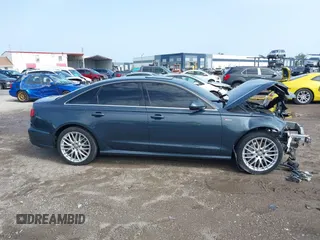 2016 Audi A6 Premium Plus with VIN WAUFGAFC3GN180467, listed as a IAAI auction lot 42429785 with 121,033 mi miles and . Bid and sale history available at DreamBid. Image 14.
