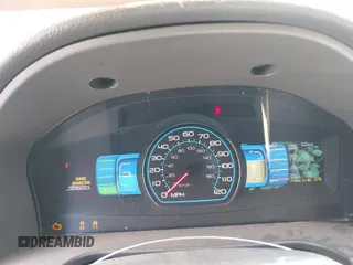 2010 Ford Fusion Hybrid z VIN 3FADP0L33AR385001, wystawiony jako IAAI lot #42074965 z przebiegiem 195 962 mil mil oraz . Historia ofert i sprzedaży dostępna na DreamBid. Obrazek 7.