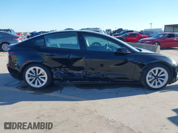 2023 Tesla Model 3 z VIN 5YJ3E1EA4PF552103, wystawiony jako IAAI lot #40782218 z przebiegiem 20 997 mil mil oraz . Historia ofert i sprzedaży dostępna na DreamBid. Obrazek 13.
