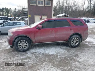 2015 Dodge Durango SXT with VIN 1C4RDJAG6FC888810, listed as a IAAI auction lot 41304507 with 125,936 mi miles and . Bid and sale history available at carsss.com. Image 14.
