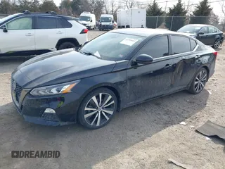 2021 Nissan Altima SR with VIN 1N4BL4CV1MN300563, listed as a IAAI auction lot 41709522 with 92,265 mi miles and . Bid and sale history available at carsss.com. Image 2.