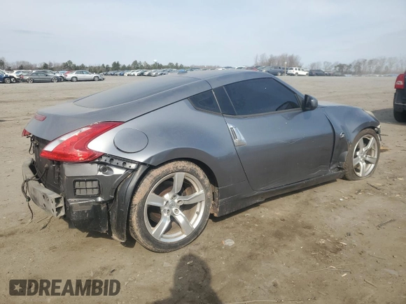 2012 Nissan 370Z с VIN JN1AZ4EH6CM562615, выставлен на аукционе Copart как лот 47623125 с пробегом 86 468 миль миль и Списание • Salvage title. История ставок и продаж доступна на DreamBid. Изображение 3.