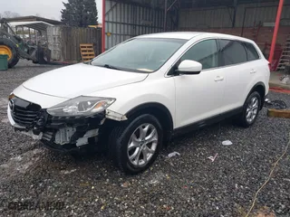 2015 Mazda CX-9 Touring with VIN JM3TB2CA1F0449033, listed as a IAAI auction lot 41549205 with 95,106 mi miles. Bid and sale history available at carsss.com. Image 2.