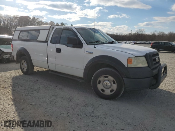2005 Ford F-150 XL with VIN 1FTRF12W05NB08240, listed as a Copart auction lot 42411995 with 333,955 mi miles and Salvage Title. Bid and sale history available at carsss.com. Image 4.