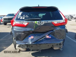 2018 Honda CR-V EX-L z VIN 7FARW1H87JE055784, wystawiony jako IAAI lot #42028869 z przebiegiem 135 222 mil mil oraz . Historia ofert i sprzedaży dostępna na DreamBid. Obrazek 17.