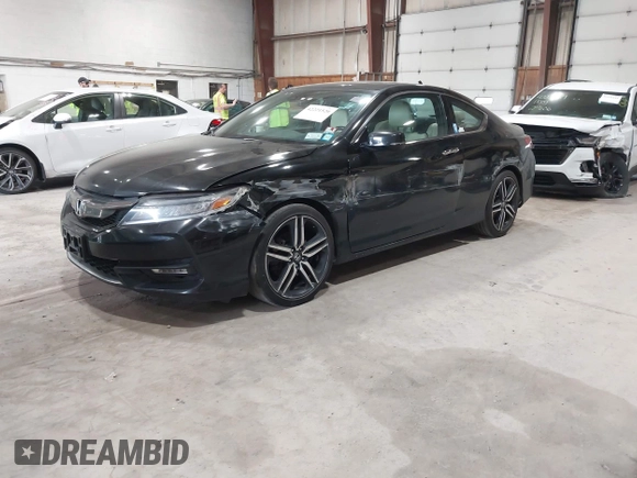 2016 Honda Accord Touring with VIN 1HGCT2B05GA002832, listed as a IAAI auction lot 42221520 with 217,435 mi miles and . Bid and sale history available at DreamBid. Image 2.