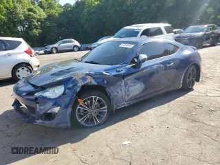 2013 Scion FR-S z VIN JF1ZNAA13D2733875, wystawiony jako Copart lot #57215545 z przebiegiem 117 303 mil mil oraz Szkoda całkowita • Salvage title. Historia ofert i sprzedaży dostępna na DreamBid. Obrazek 1.