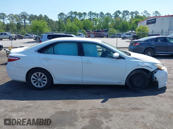 2015 Toyota Camry XLE with VIN 4T1BF1FK6FU948938, listed as a IAAI auction lot 42023487 with 107,232 mi miles. Bid and sale history available at carsss.com. Image 13.