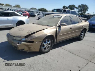 1998 Oldsmobile Intrigue GL z VIN 1G3WS52K1WF373652, wystawiony jako Copart lot #72822084 z przebiegiem 221 028 mil mil oraz Szkody całkowita. Historia ofert i sprzedaży dostępna na DreamBid. Obrazek 1.