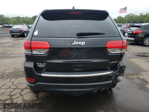 2014 Jeep Grand Cherokee Limited z VIN 1C4RJFBG7EC546642, wystawiony jako Copart lot #61445615 z przebiegiem 128 921 mil mil oraz Szkoda całkowita • Salvage title. Historia ofert i sprzedaży dostępna na DreamBid. Obrazek 6.