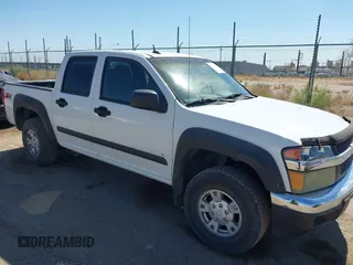 2007 Chevrolet Colorado 1LT z VIN 1GCDT13E378177112, wystawiony jako IAAI lot #42197991 z przebiegiem 239 424 mil mil oraz . Historia ofert i sprzedaży dostępna na DreamBid. Obrazek 1.