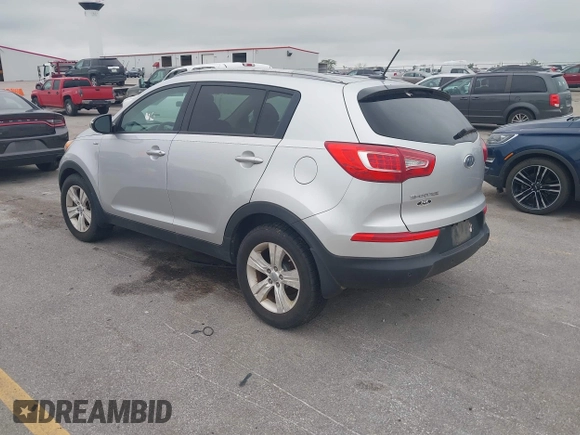 2012 Kia Sportage LX with VIN KNDPBCA24C7214432, listed as a IAAI auction lot 42530116 with 127,623 mi miles and . Bid and sale history available at DreamBid. Image 3.