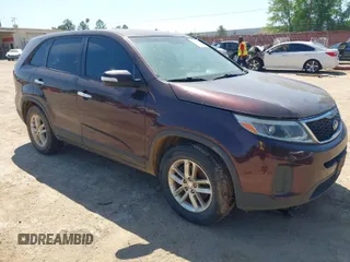 2015 Kia Sorento LX with VIN 5XYKT3A68FG619839, listed as a IAAI auction lot 42049866 with 215,471 mi miles. Bid and sale history available at carsss.com. Image 1.