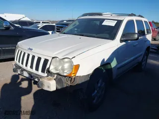 2009 Jeep Grand Cherokee Laredo with VIN 1J8GS48K29C518895, listed as a IAAI auction lot 41161045 with 153,499 mi miles. Bid and sale history available at carsss.com. Image 18.