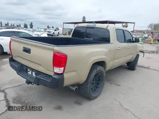 2016 Toyota Tacoma SR5 with VIN 3TMDZ5BN3GM003351, listed as a IAAI auction lot 41721932 with 100,774 mi miles and . Bid and sale history available at DreamBid. Image 4.