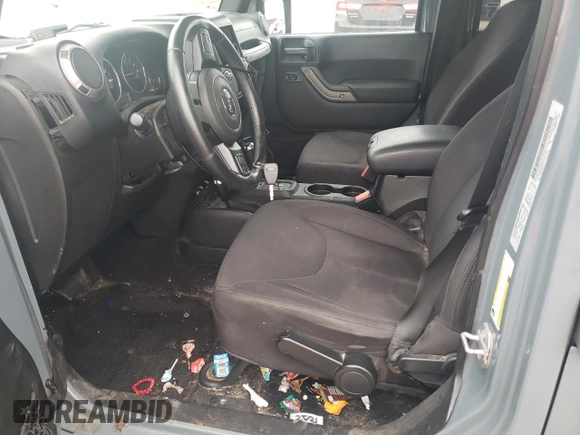2015 Jeep Wrangler Unlimited Sport with VIN 1C4BJWDGXFL551284, listed as a Copart auction lot 56905935 with 155,988 mi miles and Salvage title. Bid and sale history available at DreamBid. Image 7.