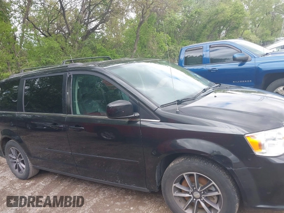 2017 Dodge Grand Caravan SXT with VIN 2C4RDGCG1HR773185, listed as a IAAI auction lot 42201139 with 166,718 mi miles and . Bid and sale history available at DreamBid. Image 13.