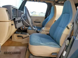 2000 Jeep Wrangler Sahara with VIN 1J4FA59S1YP777549, listed as a Copart auction lot 63622335 with 197,426 mi miles and Clean title. Bid and sale history available at DreamBid. Image 7.