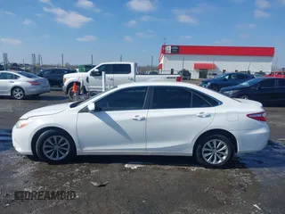 2016 Toyota Camry XLE with VIN 4T1BF1FK1GU155709, listed as a IAAI auction lot 41556465 with 159,923 mi miles and . Bid and sale history available at DreamBid. Image 14.