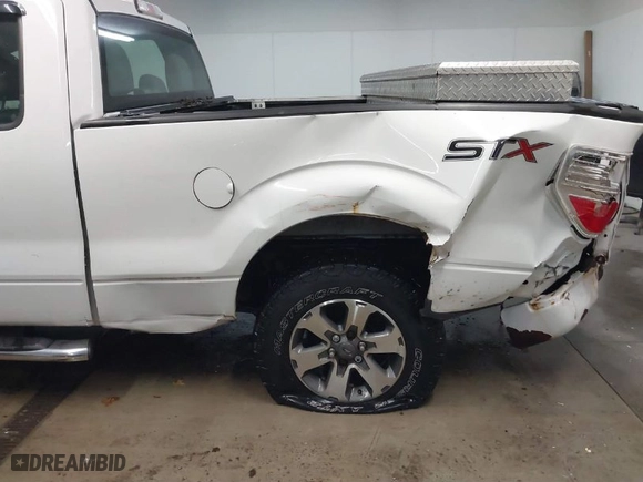 2014 Ford F-150 XL with VIN 1FTEX1CM3EFB15654, listed as a IAAI auction lot 41599447 with 148,481 mi miles. Bid and sale history available at carsss.com. Image 17.