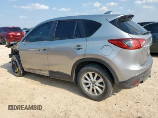 2013 Mazda CX-5 Sport with VIN JM3KE2BE5D0129797, listed as a Copart auction lot 58051185 with 200,712 mi miles and Salvage title. Bid and sale history available at DreamBid. Image 2.