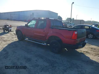 2004 Ford Explorer Sport Trac XLS z VIN 1FMZU67K64UC21974, wystawiony jako IAAI lot #42017439 z przebiegiem 193 613 mil mil oraz . Historia ofert i sprzedaży dostępna na DreamBid. Obrazek 3.