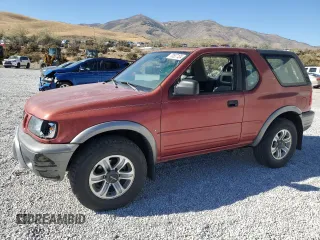 2001 Isuzu Rodeo with VIN 4S2CM57W314302812, listed as a Copart auction lot 73537124 with 180,072 mi miles and Salvage title. Bid and sale history available at DreamBid. Image 1.