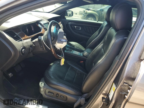 2013 Ford Taurus Limited with VIN 1FAHP2F85DG225363, listed as a Copart auction lot 56127255 with 128,660 mi miles and Salvage title. Bid and sale history available at DreamBid. Image 7.