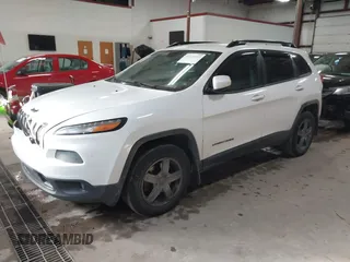 2014 Jeep Cherokee Latitude with VIN 1C4PJMCS5EW288909, listed as a IAAI auction lot 41531117 with 108,971 mi miles and . Bid and sale history available at carsss.com. Image 2.