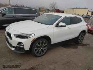 2020 BMW X2 sDrive28i with VIN WBXYH9C02L5R10335, listed as a IAAI auction lot 40651317 with 67,897 mi miles. Bid and sale history available at carsss.com. Image 2.