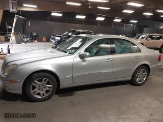 2006 Mercedes-Benz E-Class 3.5L with VIN WDBUF87J76X182677, listed as a IAAI auction lot 42016237 with 150,085 mi miles. Bid and sale history available at carsss.com. Image 14.
